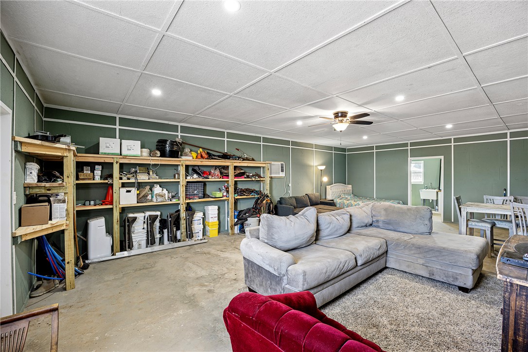 276 Charton Road Morrilton, AR 72110 - Photo 9 of 37 Spacious multi-purpose room featuring a drop ceiling with recessed lighting and a ceiling fan