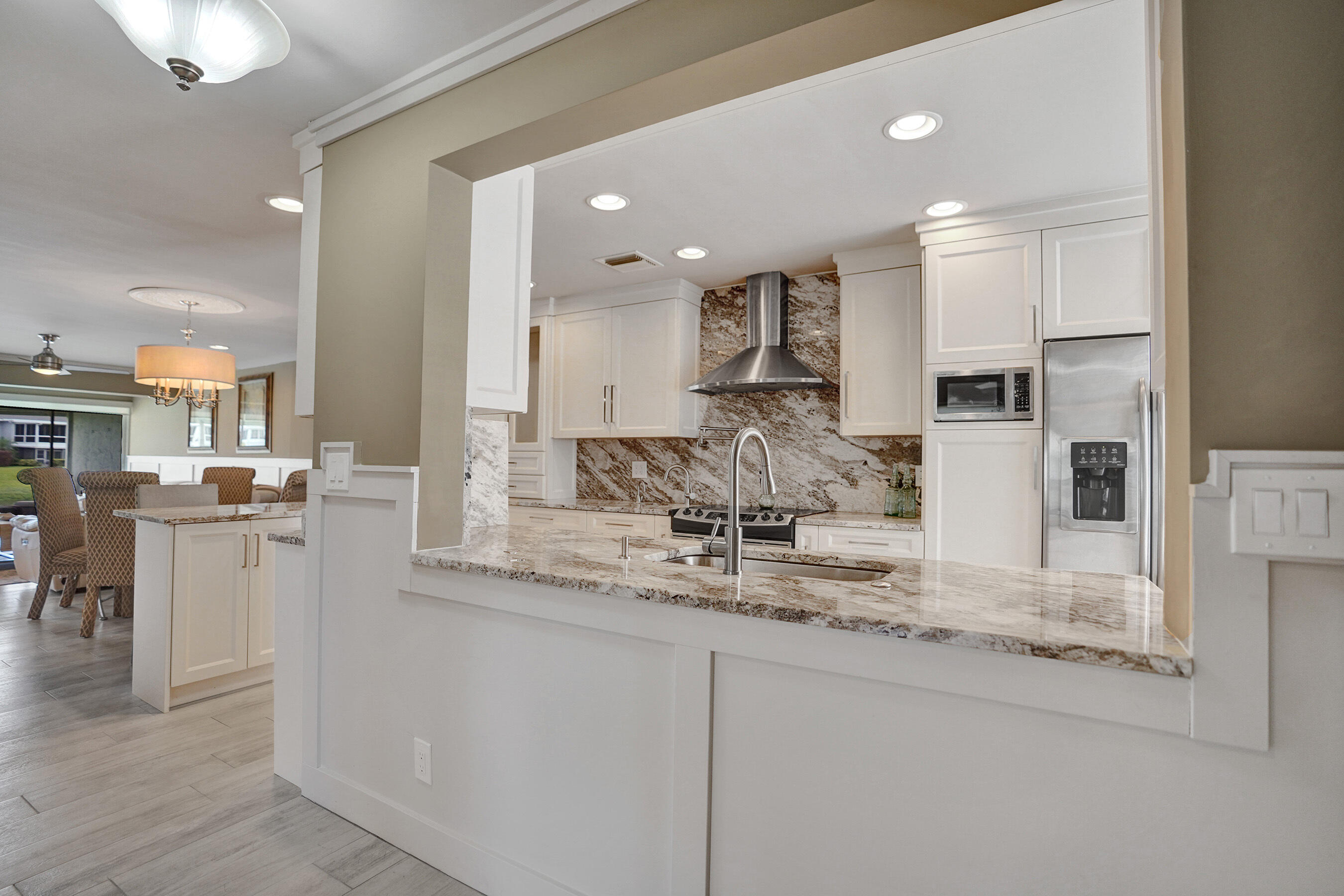 2820 Southwest 13th Street, Unit 101 Delray Beach, FL 33445 - Photo 59 of 83 Entrance hall