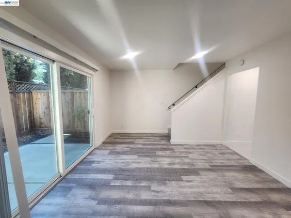 a view of an empty room and window