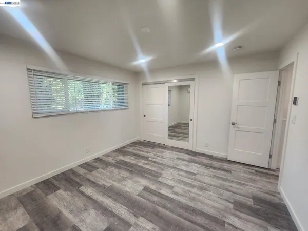 an empty room with windows