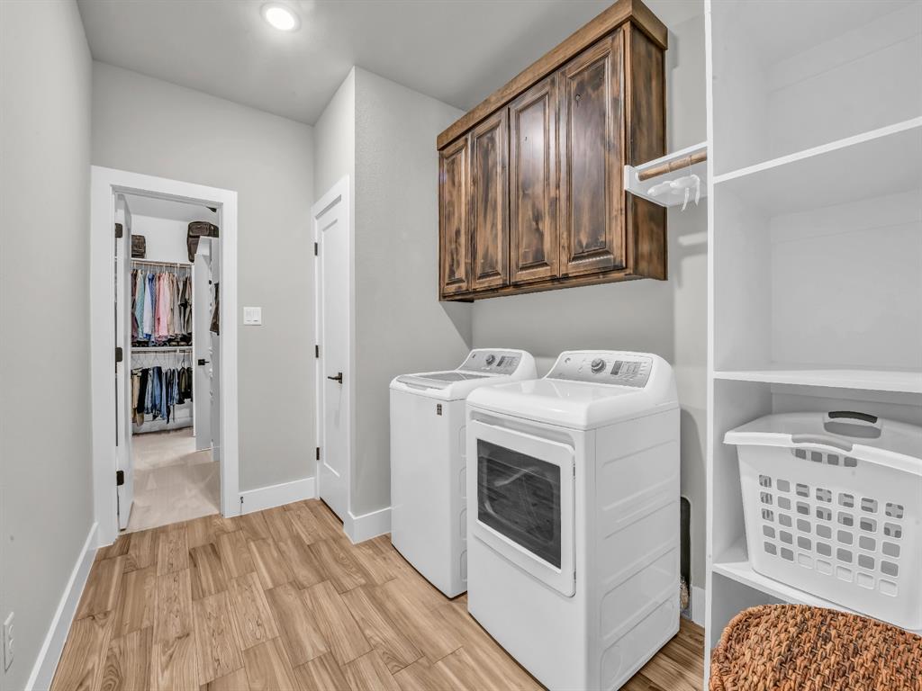 129 Maravilla Drive Aledo, TX 76008 - Photo 13 of 40 Laundry conveniently attached to master closet