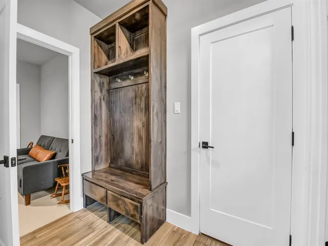 a living room with furniture and a gate