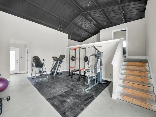 a workspace with furniture and window