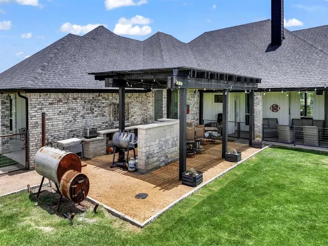a backyard of a house with lots of green space