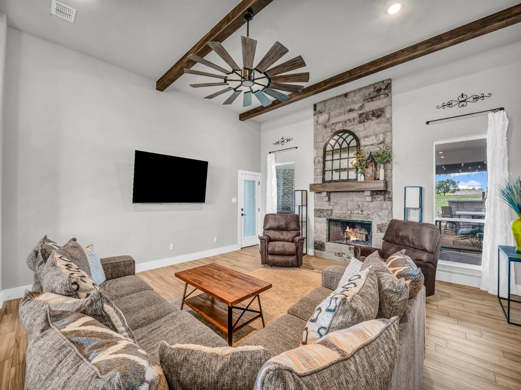 129 Maravilla Drive Aledo, TX 76008 - Photo 7 of 40 Living with wood burning fireplace