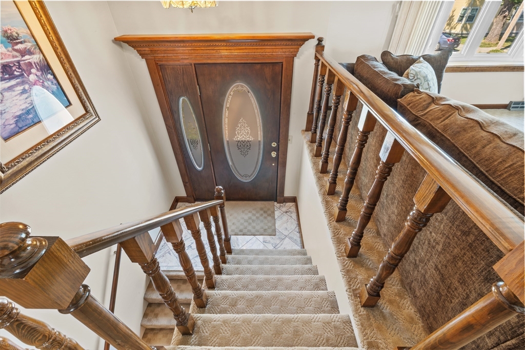 403 Aetna Street Fall River, MA 02721 - Photo 27 of 42 a view of stairs and with wooden floor