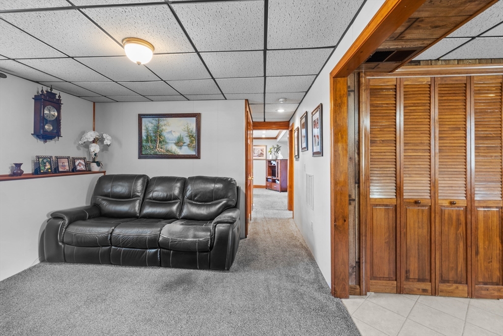 403 Aetna Street Fall River, MA 02721 - Photo 36 of 42 a couches and a couch in a room next to a window