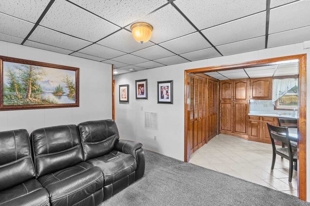 403 Aetna Street Fall River, MA 02721 - Photo 37 of 42 a living room with furniture