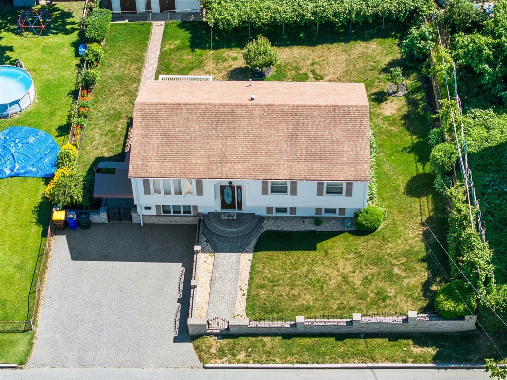 403 Aetna Street Fall River, MA 02721 - Photo 5 of 42 an aerial view of a house with yard swimming pool and outdoor seating
