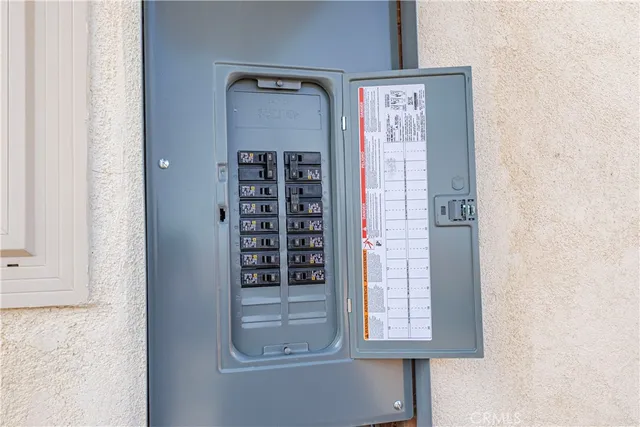 a kitchen with white cabinets and center island