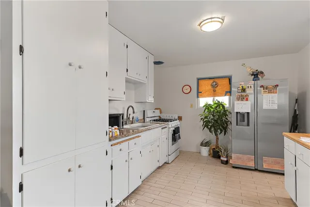 a storage room with washer and dryer
