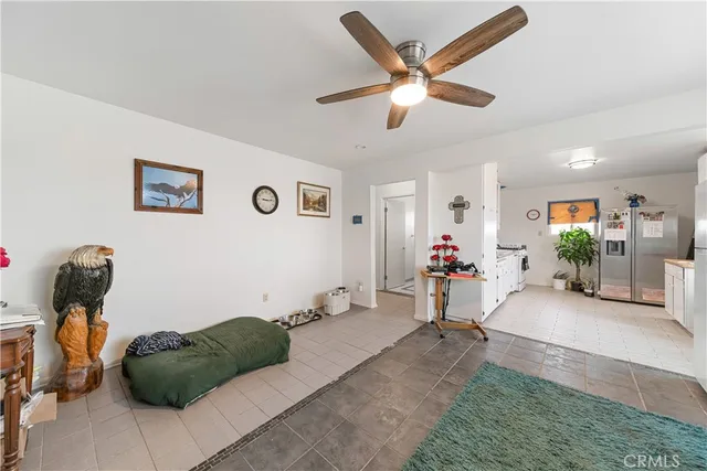 a view of bathroom with a shower and a toilet