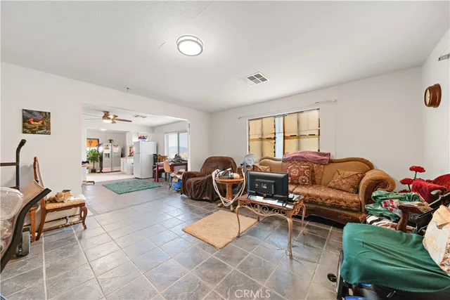 a bedroom with a bed and dresser