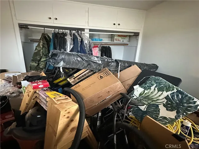 an aerial view of residential building with parking space