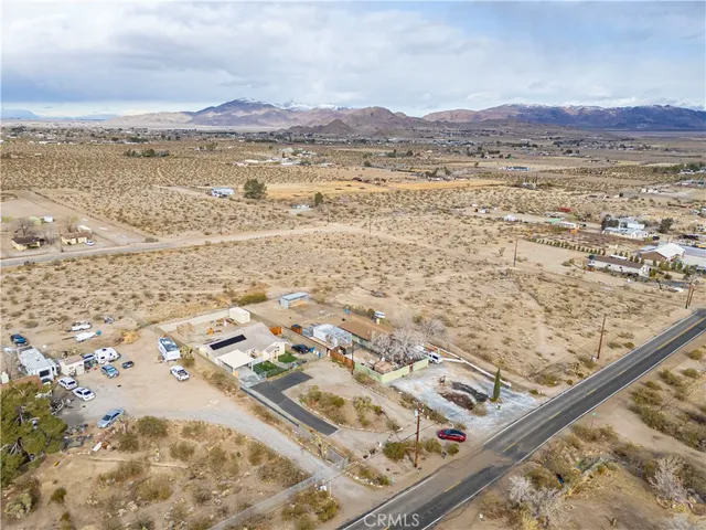 an aerial view of beach and ocean