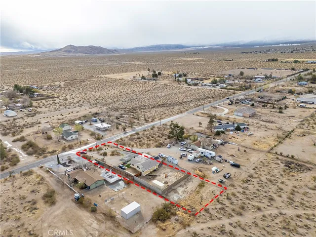 an aerial view of residential house with outdoor space