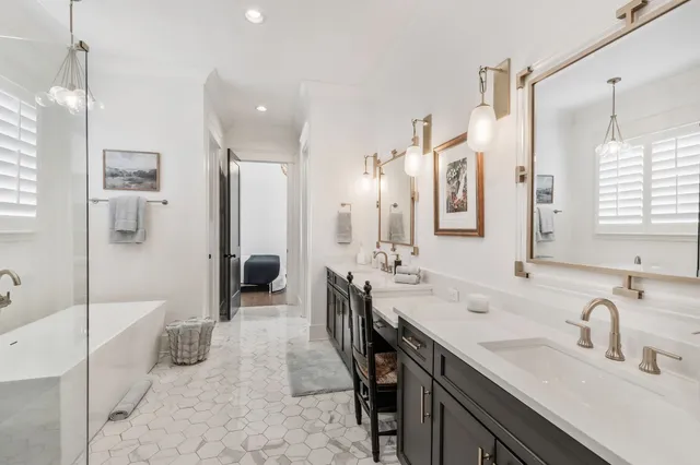 a bathroom with a bathtub and a shower