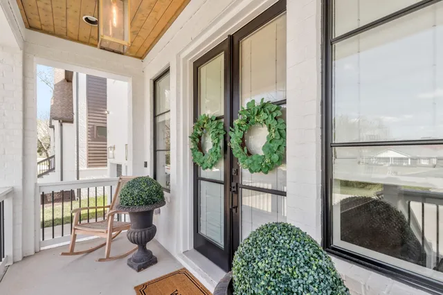 a view of a potted plants in front of a glass door