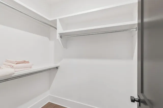 a view of a bathroom with a sink and a mirror
