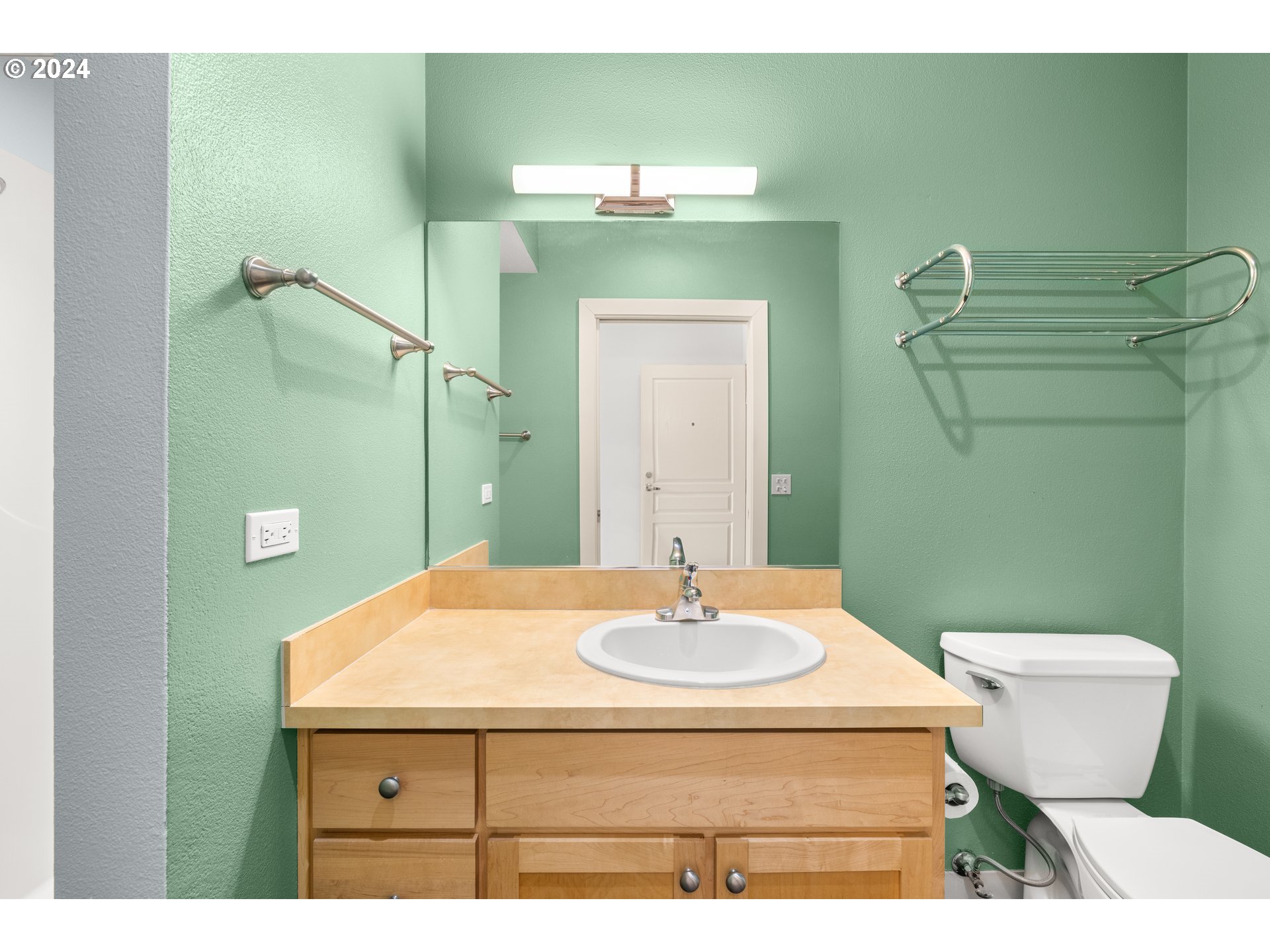 1134 Southwest Jefferson Street, Unit 508 Portland, OR 97201 - Photo 19 of 29 a bathroom with a sink and a mirror