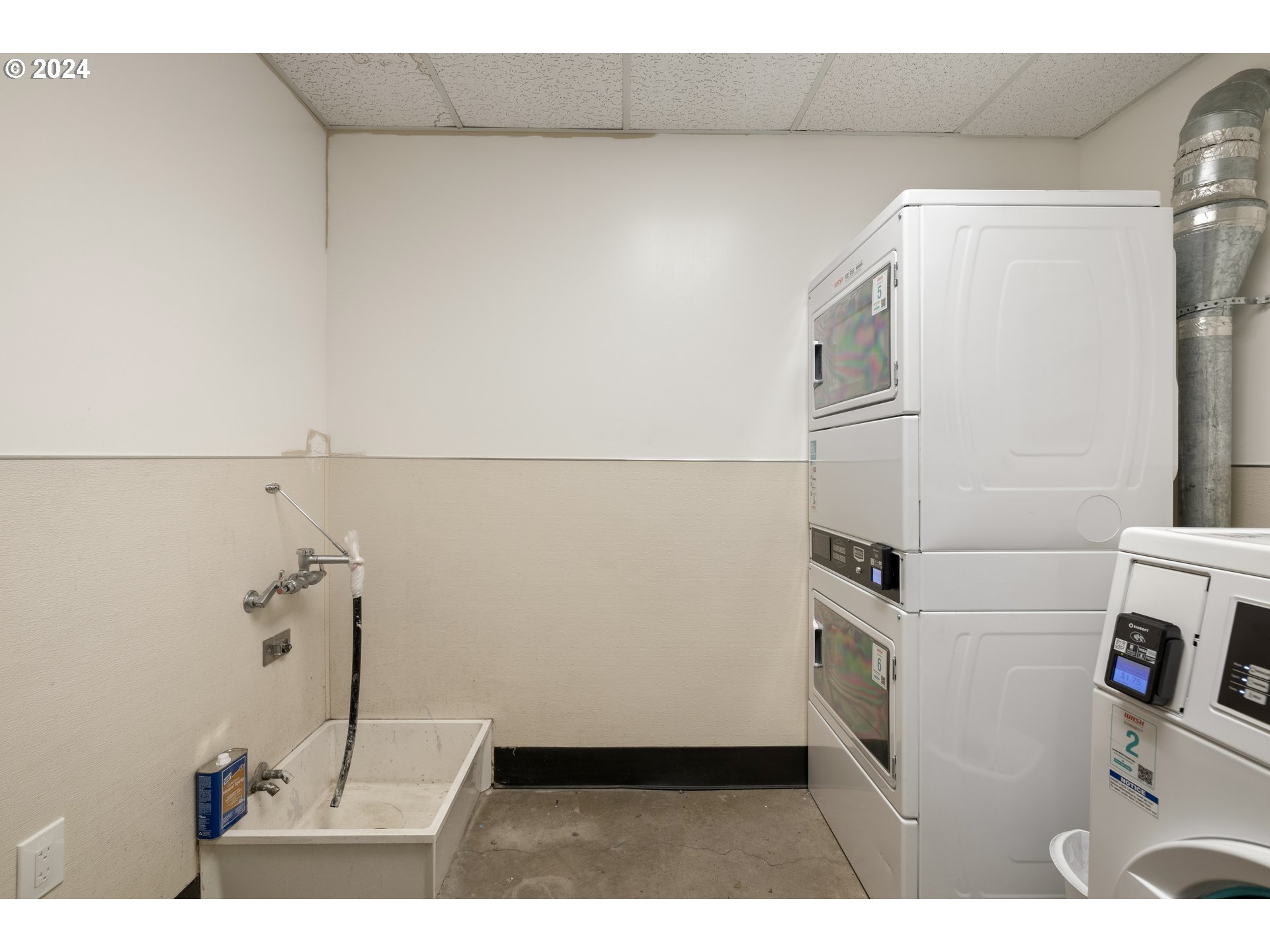 1134 Southwest Jefferson Street, Unit 508 Portland, OR 97201 - Photo 23 of 29 a utility room with dryer and washer