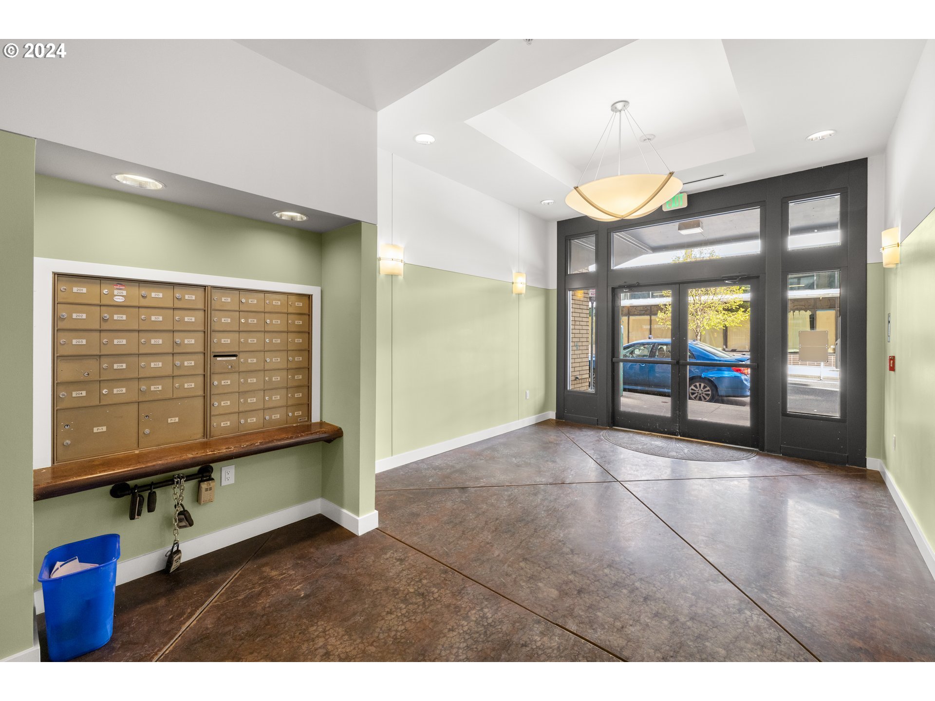 1134 Southwest Jefferson Street, Unit 508 Portland, OR 97201 - Photo 5 of 29 a view of an entryway with a floor to ceiling window