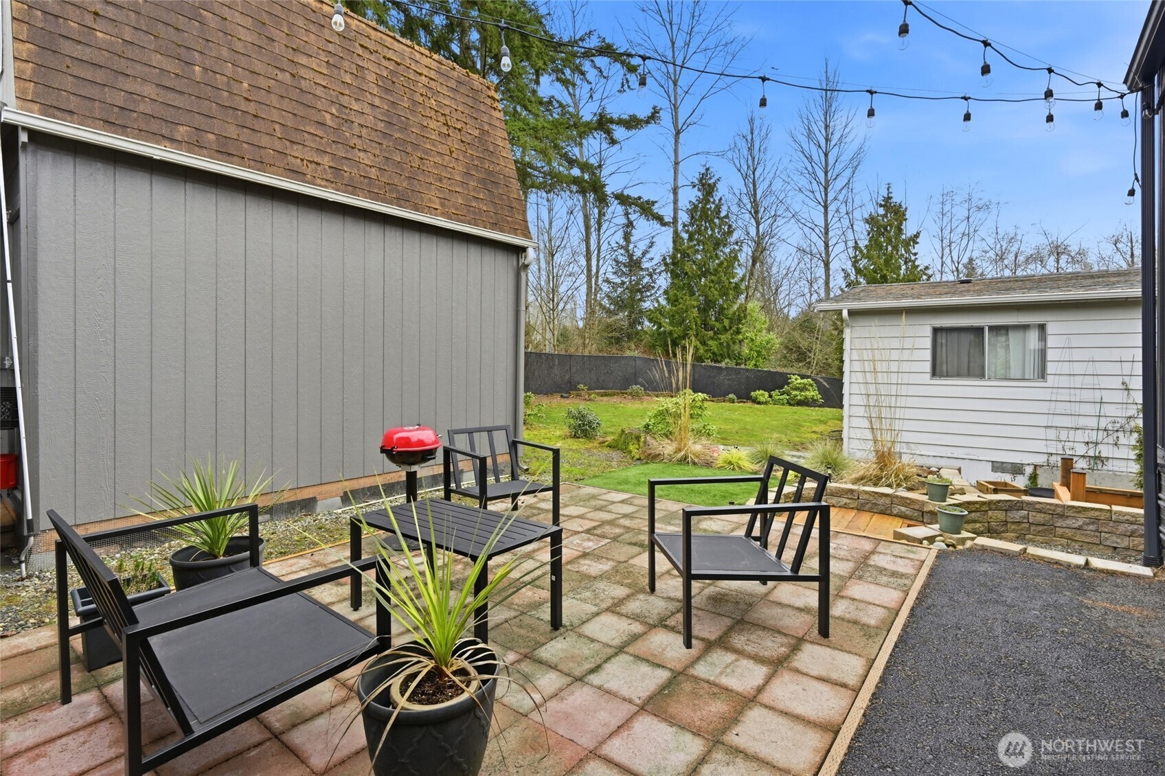 2200 196th Street Southeast, Unit 61 Bothell, WA 98012 - Photo 13 of 21 a view of a chairs and table in patio of the house