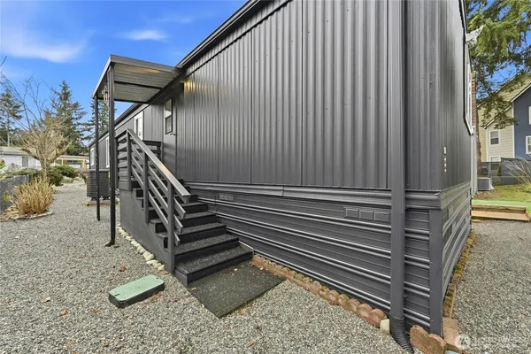 a view of a balcony with chairs