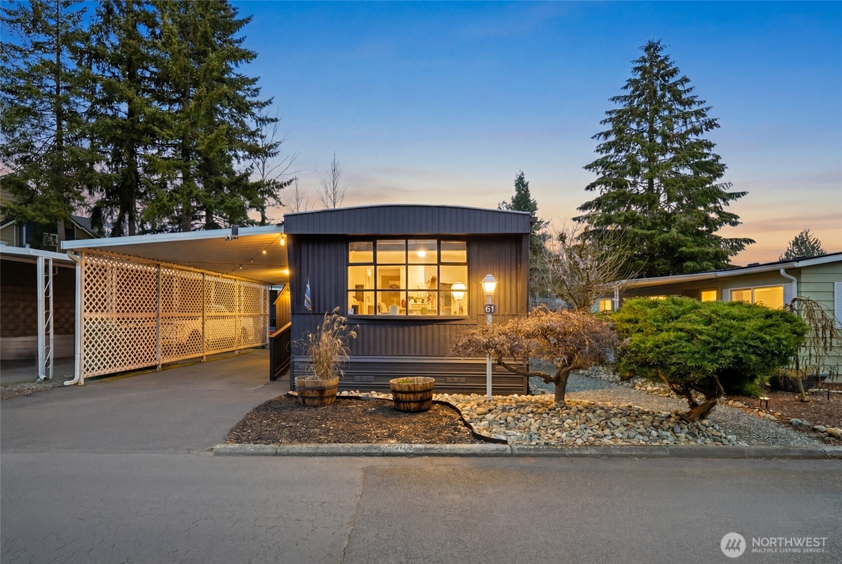 2200 196th Street Southeast, Unit 61 Bothell, WA 98012 - Photo 21 of 21 a front view of a house with garden