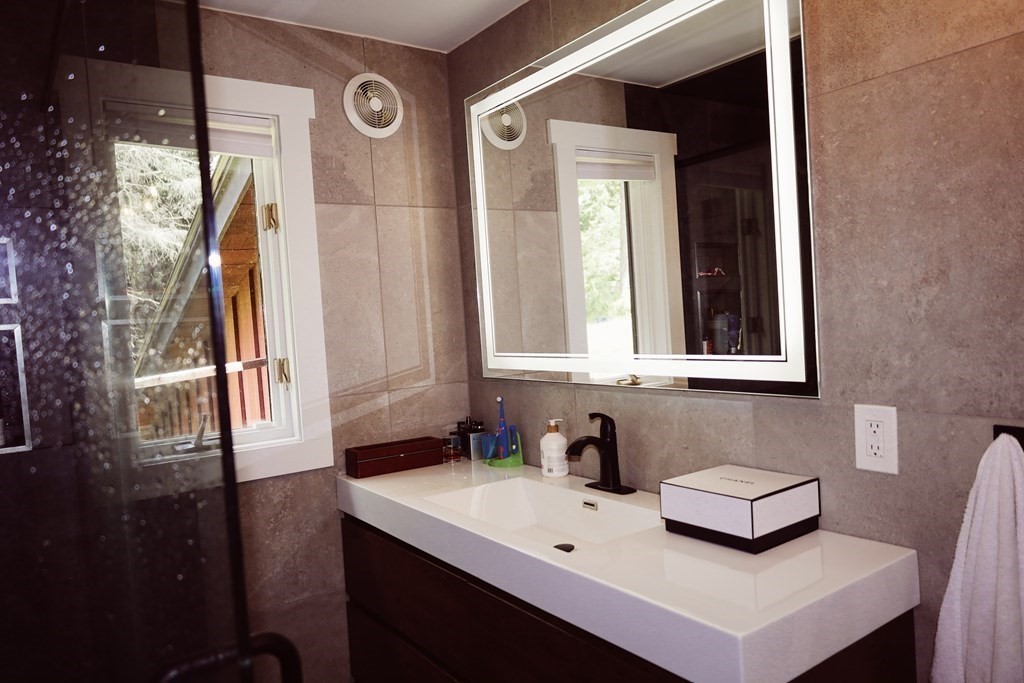 80 Rock-A-Dundee Road Hampden, MA 01036 - Photo 18 of 42 a kitchen with a sink cabinets and window