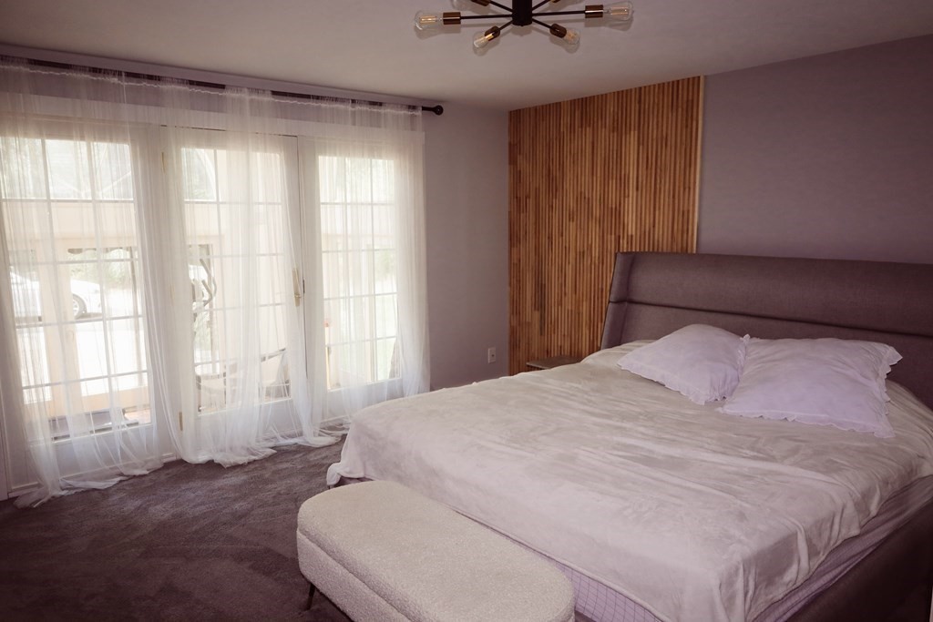 80 Rock-A-Dundee Road Hampden, MA 01036 - Photo 25 of 42 a bedroom with a bed and a window