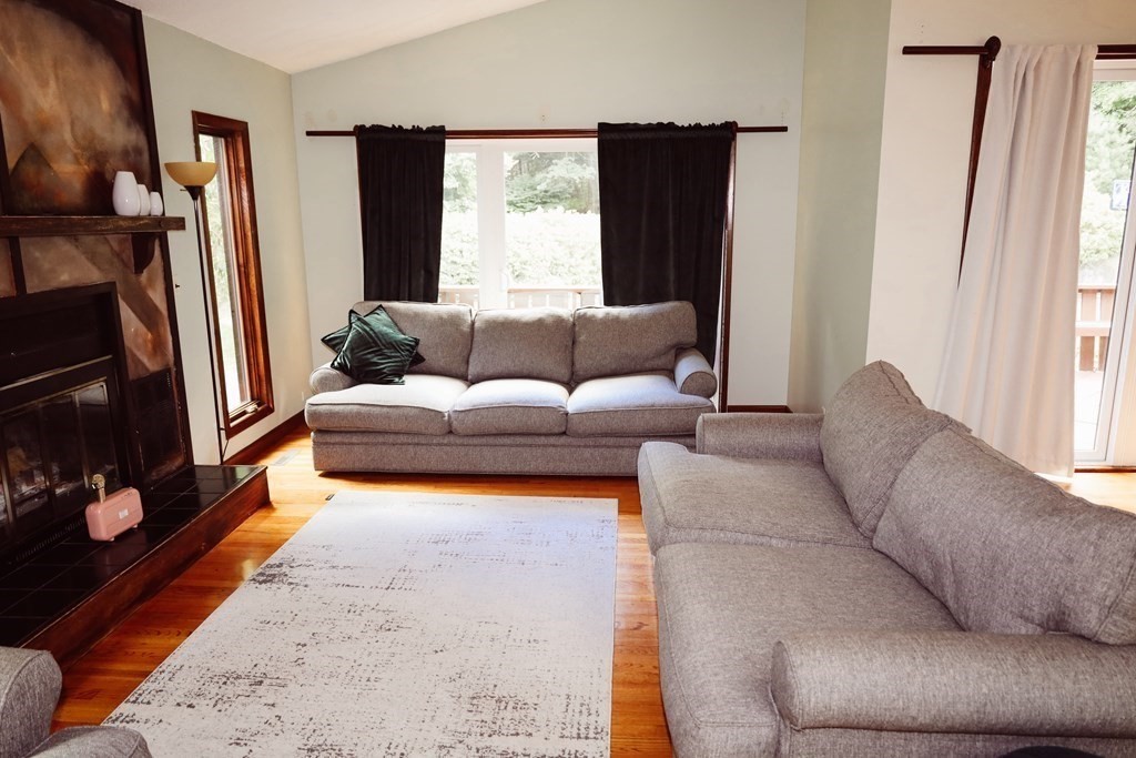 80 Rock-A-Dundee Road Hampden, MA 01036 - Photo 30 of 42 a living room with furniture window and a flat screen tv