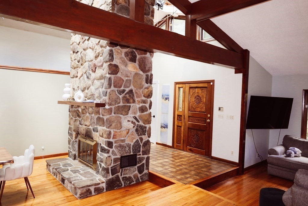80 Rock-A-Dundee Road Hampden, MA 01036 - Photo 35 of 42 a living room with furniture and a rug