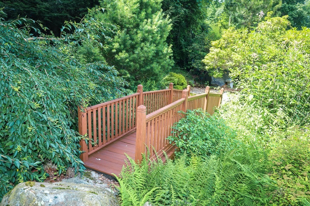 80 Rock-A-Dundee Road Hampden, MA 01036 - Photo 5 of 42 a balcony with lots of green trees in the background