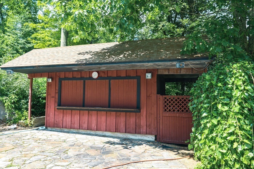 80 Rock-A-Dundee Road Hampden, MA 01036 - Photo 10 of 42 a view of backyard with potted plants and large tree