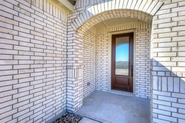 a front view of a house with a shower