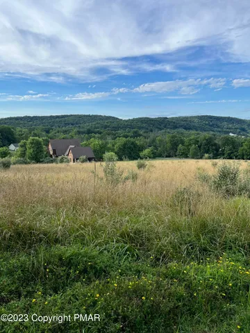 a view of mountain with outdoor space