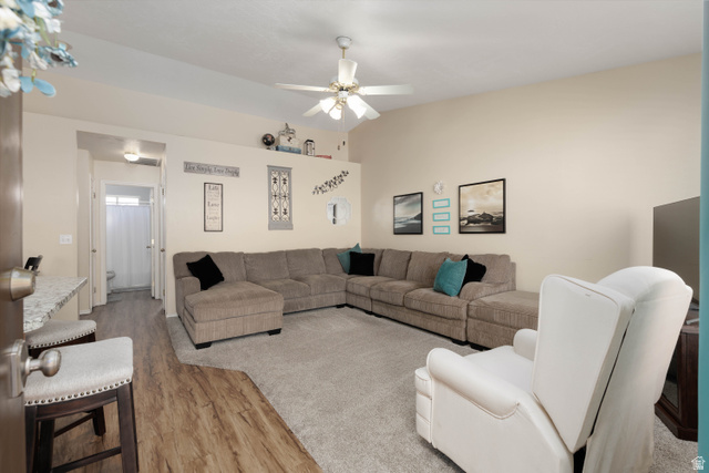 161 West 950 South, Unit S4 St. George, UT 84770 - Photo 5 of 21 Living area with light wood finished floors, ceiling fan, and vaulted ceiling
