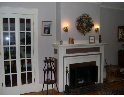 64 Oak Cliff Road Newton, MA 02460 - Photo 2 of 21 a living room with furniture and a fireplace