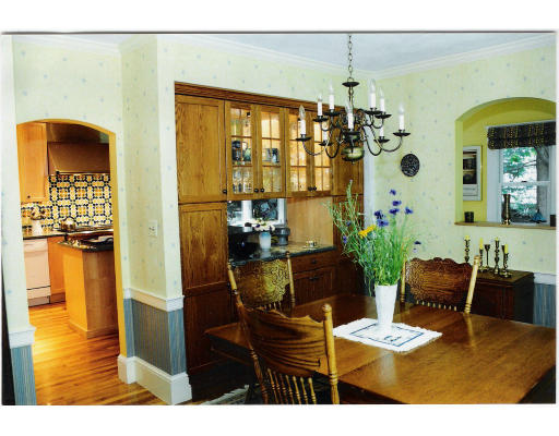 64 Oak Cliff Road Newton, MA 02460 - Photo 6 of 21 a living room with furniture and a chandelier