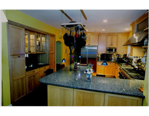 64 Oak Cliff Road Newton, MA 02460 - Photo 8 of 21 a kitchen with sink and refrigerator