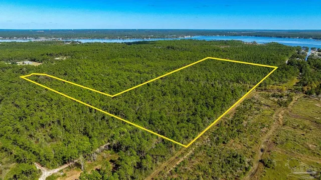 a view of a balcony with an ocean