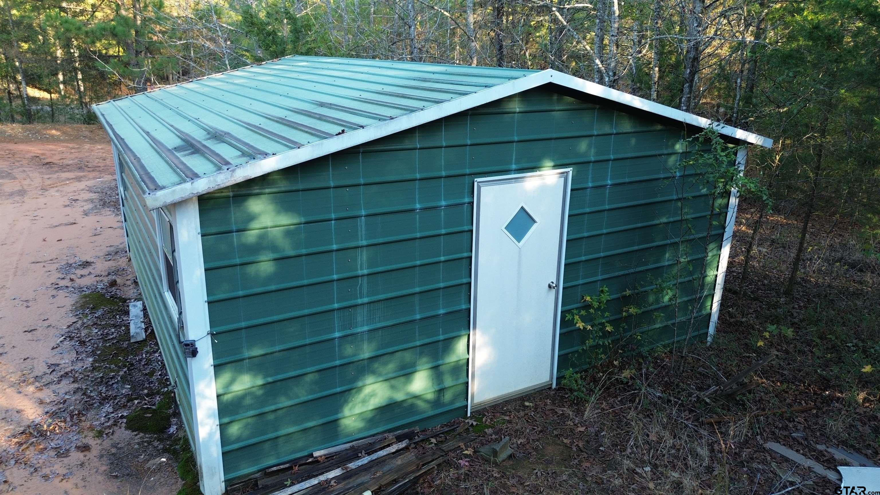 1204 Vance Hughes Springs, TX 75656 - Photo 11 of 26 a backyard of a house