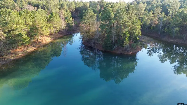 a view of lake with green space