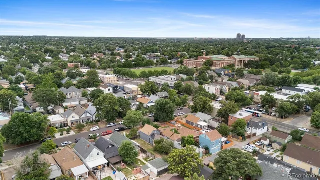 an aerial view of a city with lots of residential buildings