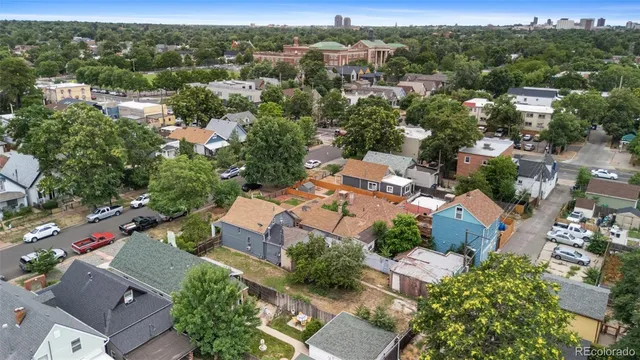 an aerial view of a city with lots of residential buildings