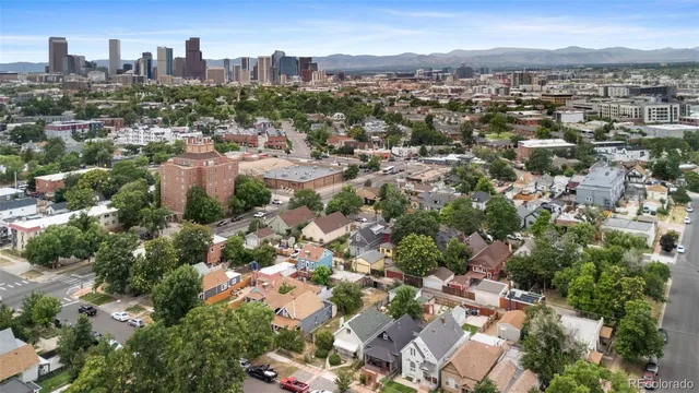 an aerial view of a city with lots of residential buildings