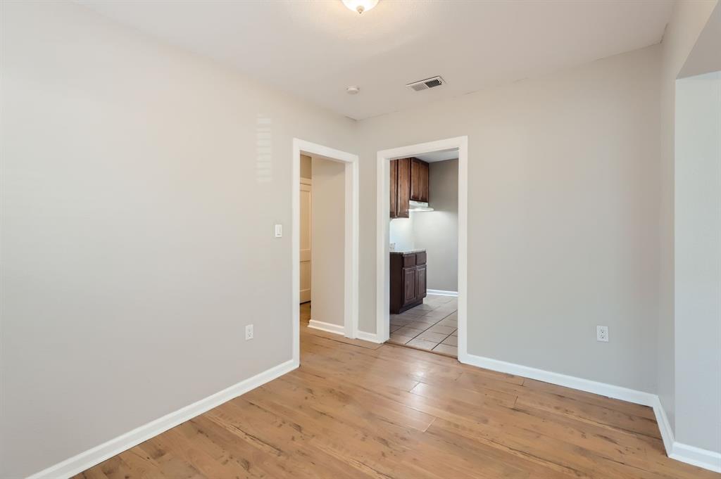224 East Boyd Street Bonham, TX 75418 - Photo 8 of 28 a view of hallway with wooden floor