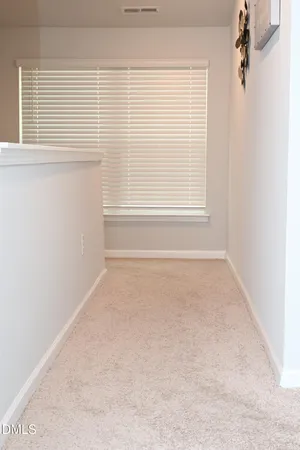 a view of a window in an empty room