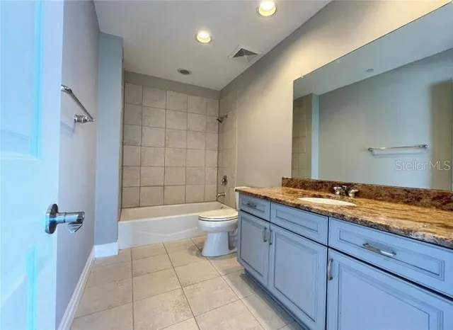 a car parked in a parking area of a building